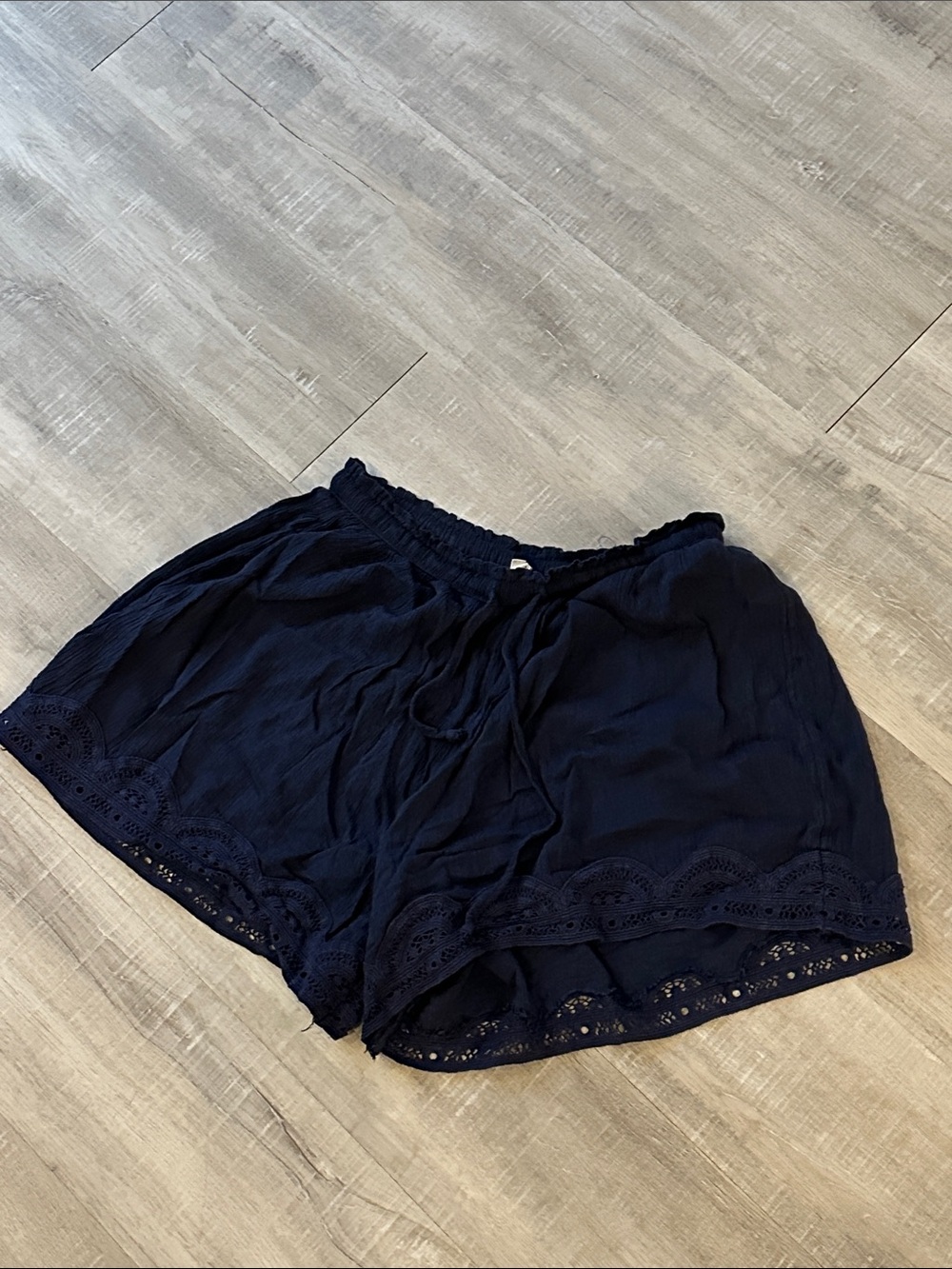Navy blue shorts with lace detail
